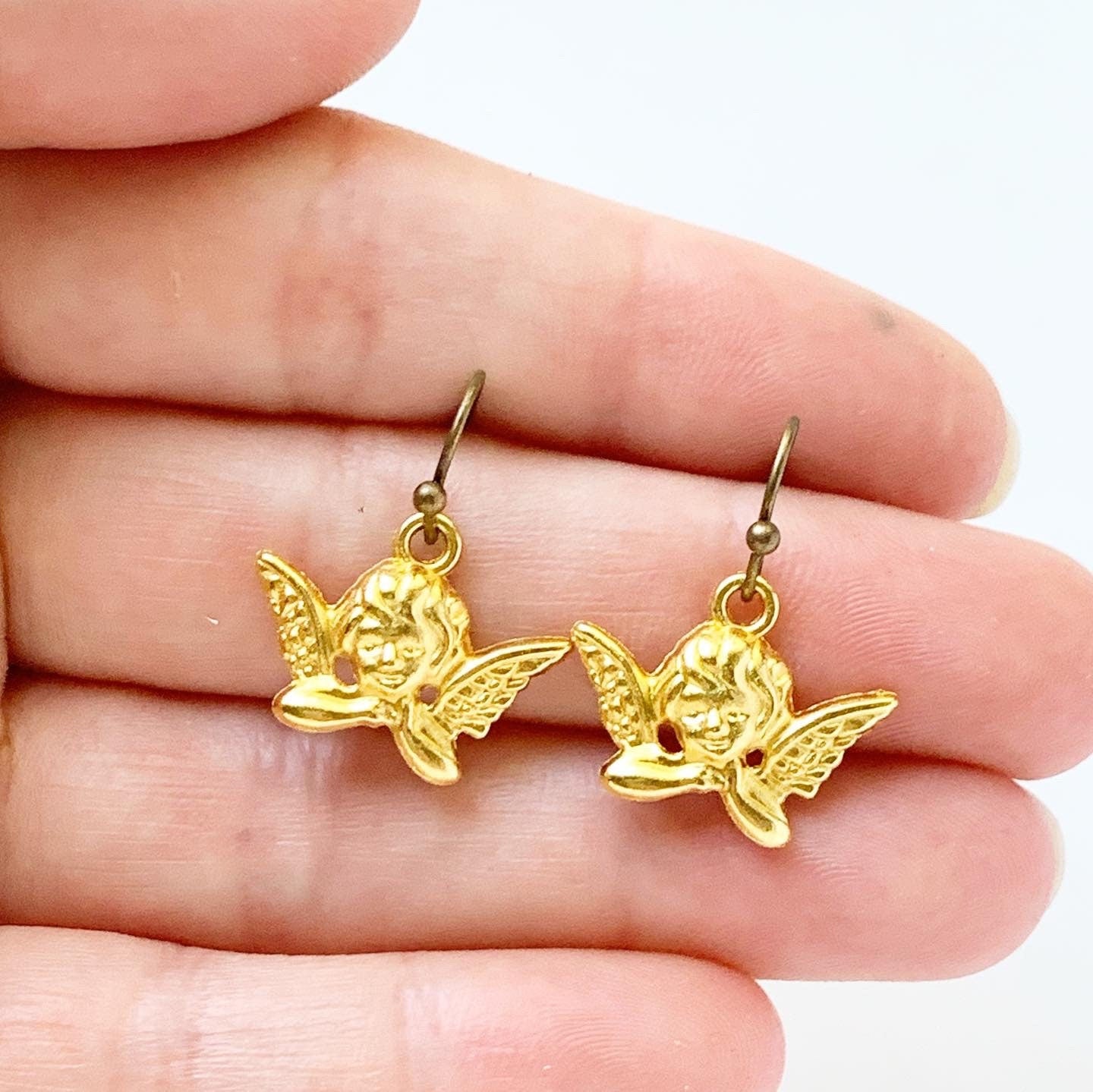 Baby sales angel earrings